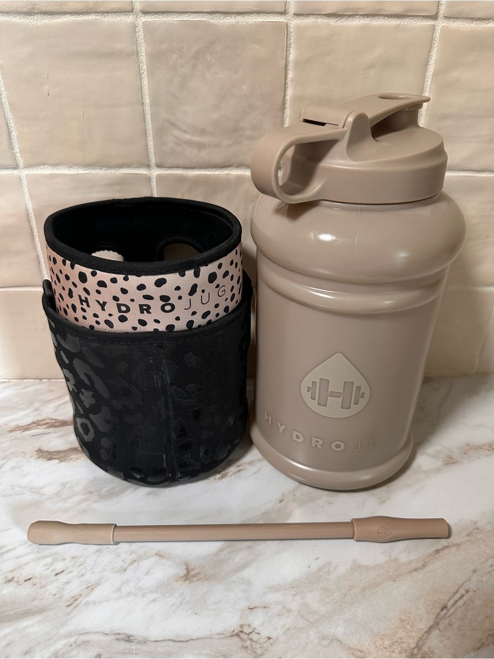 HydroJug grey, beige, black leopard print water bottle bundle.